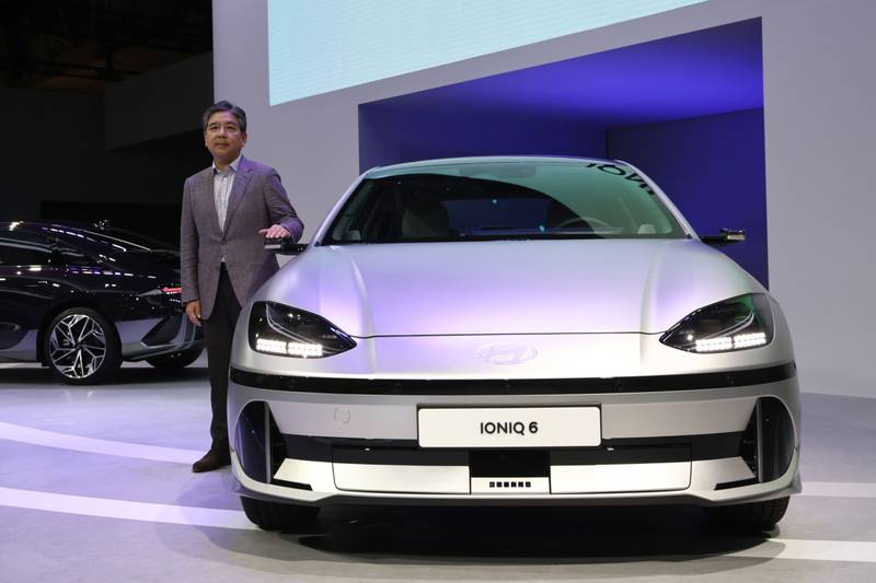 Jaehoon Chang, president and chief executive officer of Hyundai Motor Company, next to the company's Ioniq 6 electric vehicle. Bloomberg 