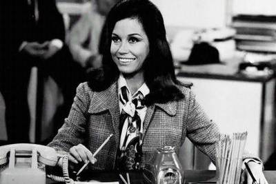 In addition to being one of the earliest TV shows to be set in a newsroom, The Mary Tyler Moore Show was unique in that focused on an unmarried, career-minded woman in her thirties - Mary Richards, the producer of the fictional Six O'Clock News. AP Photo