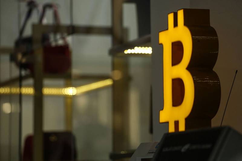 The Bitcoin logo in a shopping centre. CBDCs are expected to provide some middle ground for the highly volatile cryptocurrency market. Bloomberg
