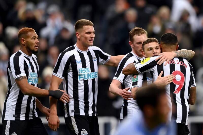 Newcastle United players celebrate after Bournemouth's Adam Smith scored an own goal during the League Cup fourth round match at St James' Park on December 20, 2022. Newcastle won the game 1-0. Getty