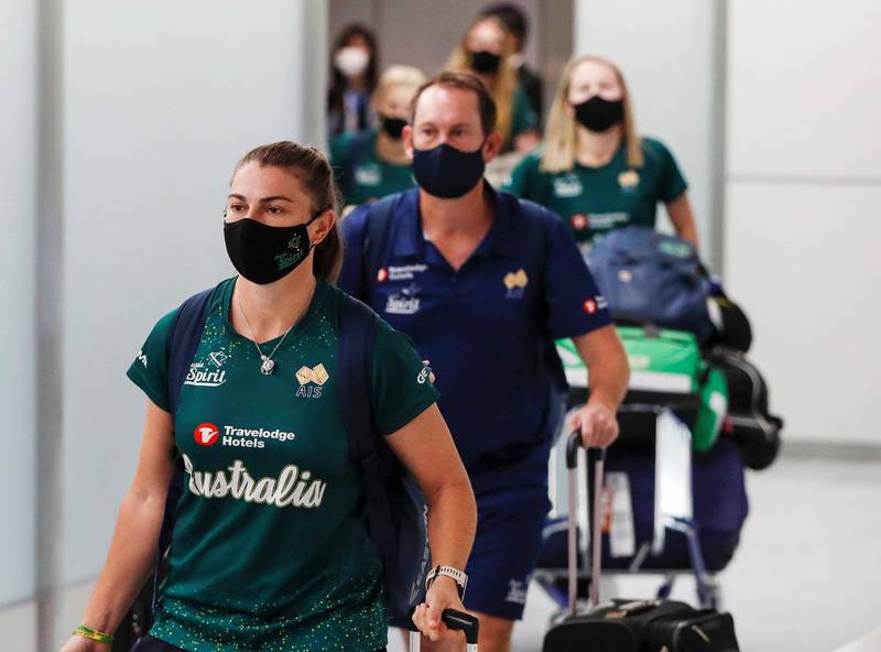 Members of Australia's Olympic softball squad including Jade Wall, arrive in Tokyo for a pre-Olympic training camp. Reuters