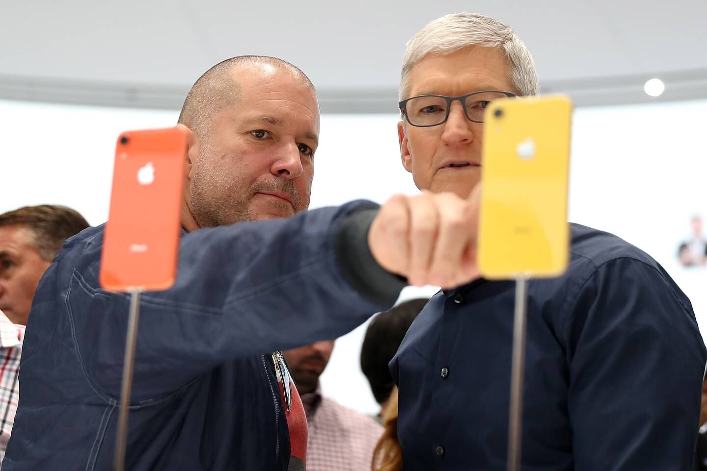 Sir Jony Ive with his former boss, Apple CEO Tim Cook, in 2018 - one year before he left to form LoveFrom. Getty Images