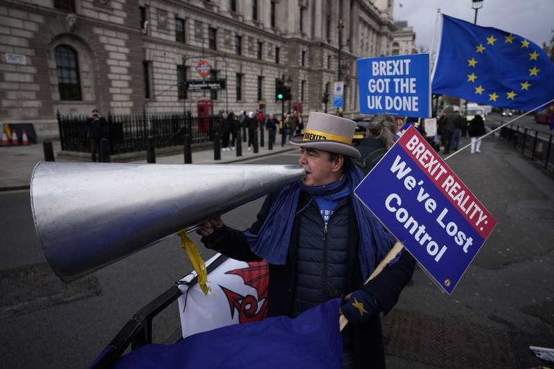 Anti-Brexit protester Steve Bray demonstrates on the edge of Parliament Square across the street from the Houses of Parliament, in London. AP