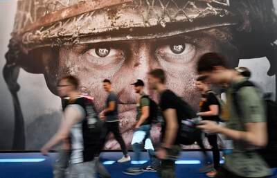 An advertisement for the video game Call of Duty. British regulators are taking a second look Microsoft's $69 billion deal to buy videogame maker Activision. AP