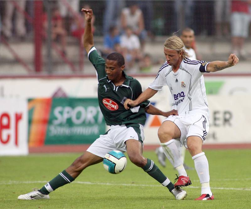 Plymouth's Barry Hayler, left, is challenged by Real Madrid's Gutierrez during their pre-season friendly match at Kapfenberg, in Austria's southern province of Styria on July 21, 2006.  Reuters