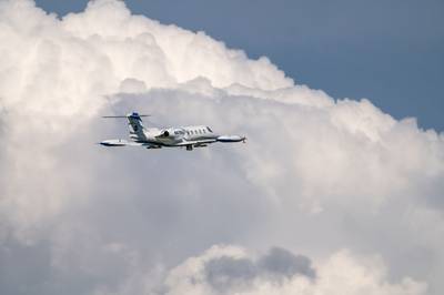 An aeroplane carrying out the cloud seeding trial over Texas