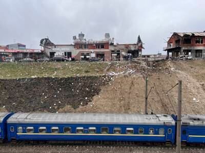 A train travelling from Dnipro passes by the site of an air strike in Lviv, western Ukraine. AP Photo