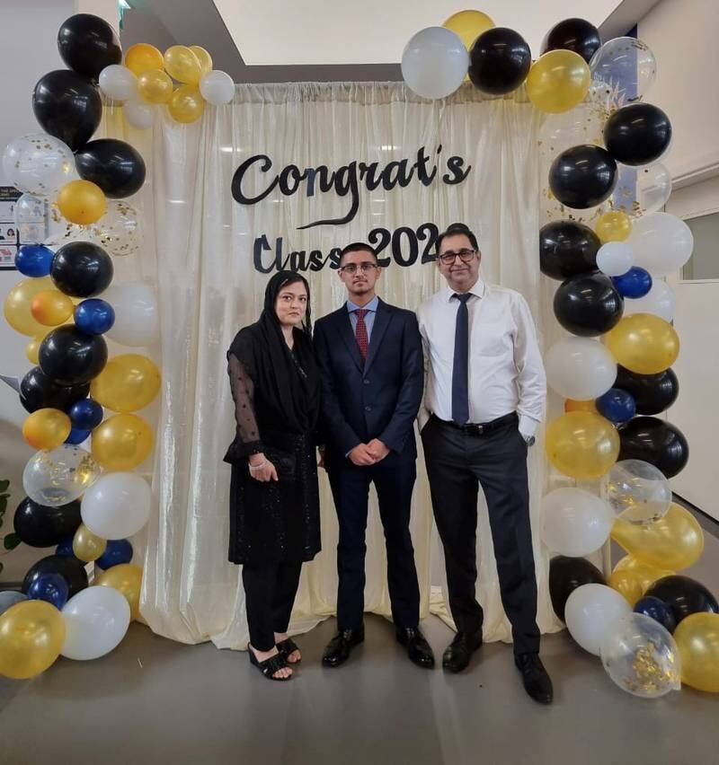 Muneeb Alvi, a pupil at Pristine Private School Dubai, received three A*, with his parents Hina Nihal and Nihal Alvi. Photo: Muneeb Alvi 
