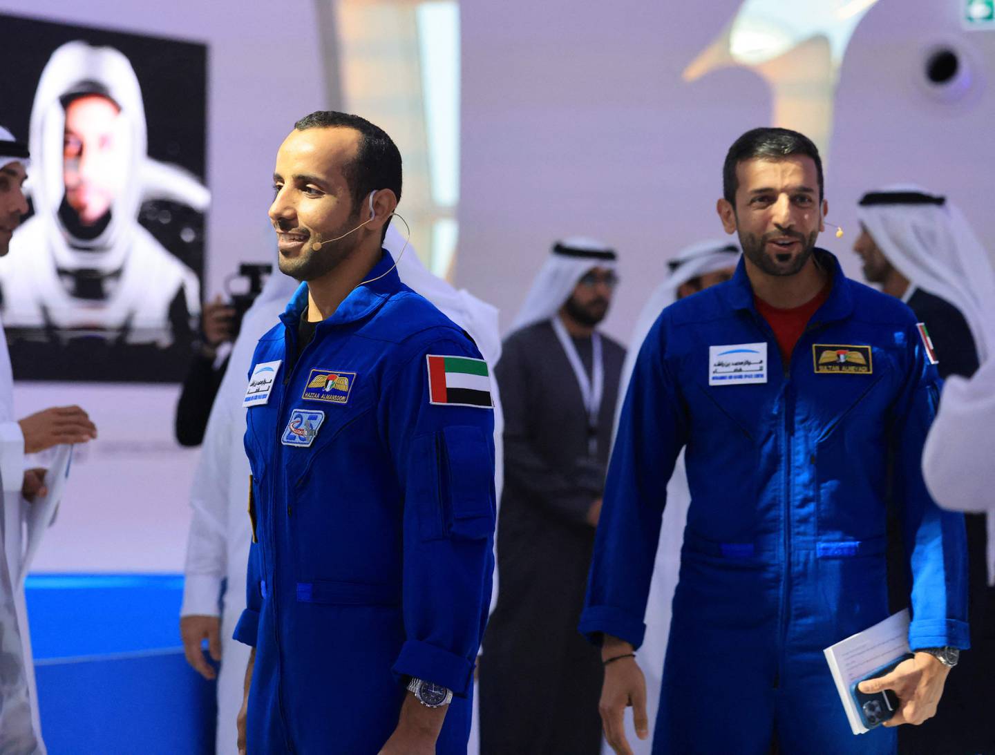 UAE astronauts Sultan Al Neyadi, right, and Hazza Al Mansoori arrive at the Museum of the Future press conference. AFP