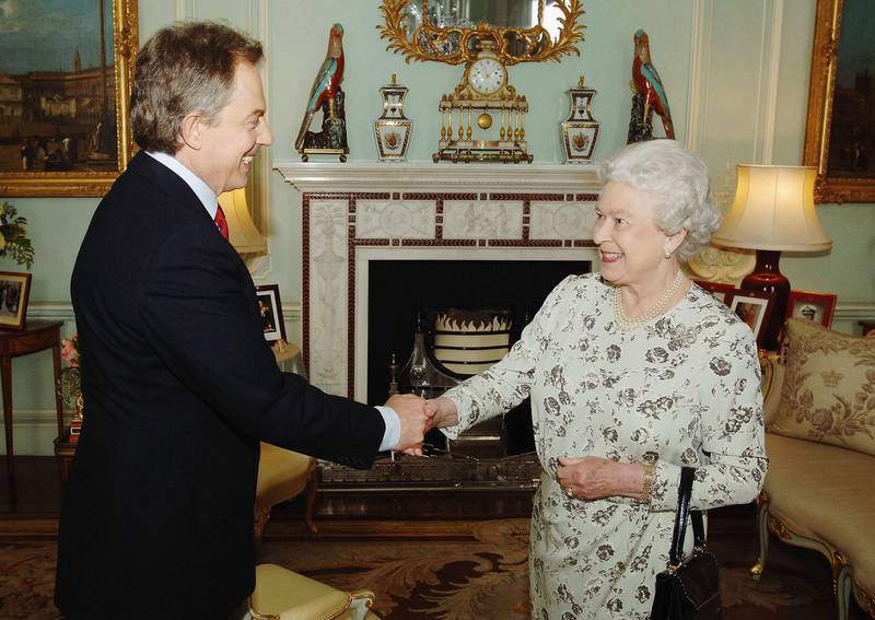 Newly re-elected prime minister Tony Blair shakes hands with Queen Elizabeth in 2005. Getty Images