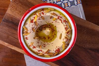Hummus: have yours freshly made and garnished with pine nuts. Photo: Bait Maryam 