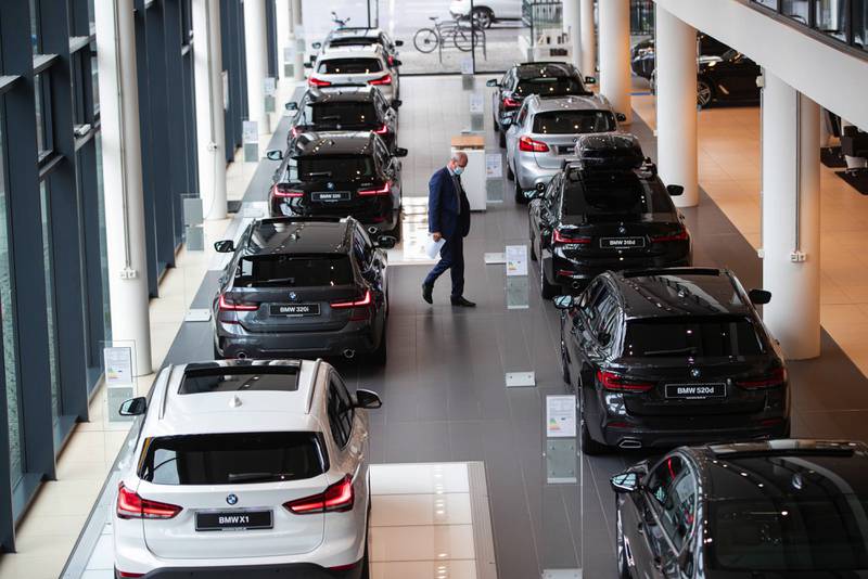 Cars at a BMW showroom in Berlin. Vehicle insurance is among the services offered by InsureTech company wefox in Europe. Bloomberg