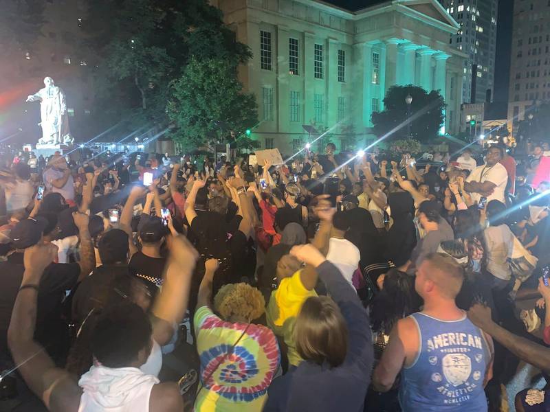 In a photo provided by Jada W., protesters gather Thursday, May 28, 2020, in downtown Louisville, Ky., against the police shooting of Breonna Taylor, a black woman fatally shot by police in her home in March. At least seven people were shot during the protest. (Jada W. via AP)