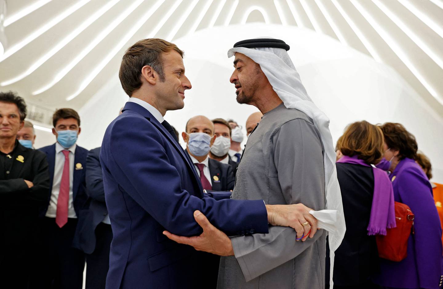 Sheikh Mohamed bin Zayed, Crown Prince of Abu Dhabi and Deputy Supreme Commander of the Armed Forces, greets French President Emmanuel Macron at Expo 2020 Dubai in December. AFP