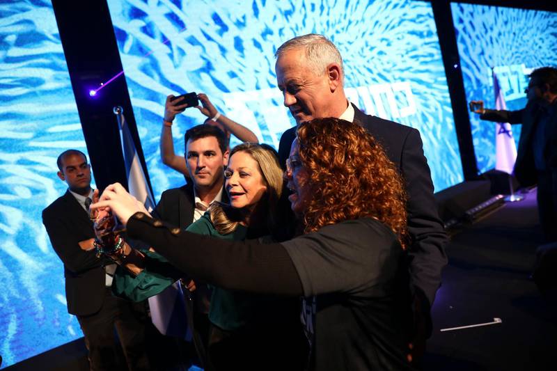 Blue and White party leader Benny Gantz with supporters during election campaign rally in Tel Aviv, Israel, Saturday, Feb. 29, 2020. (AP Photo/Oded Balilty)