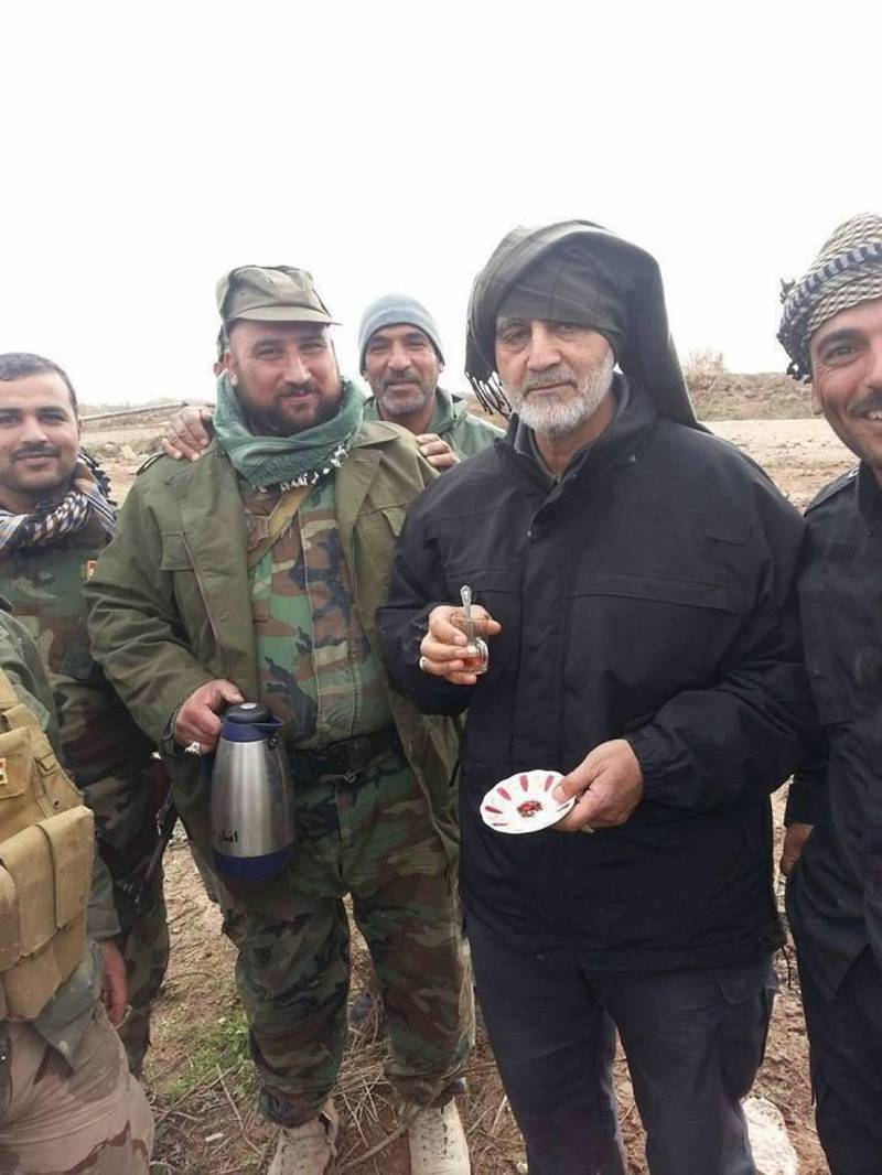 Suleimani, the commander of Iran's Quds Force, drinking tea in Tikrit in 2015.