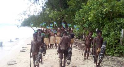 Students attend a climate change protest in Marovo Island, Solomon Islands. 350 PACIFIC via Reuters