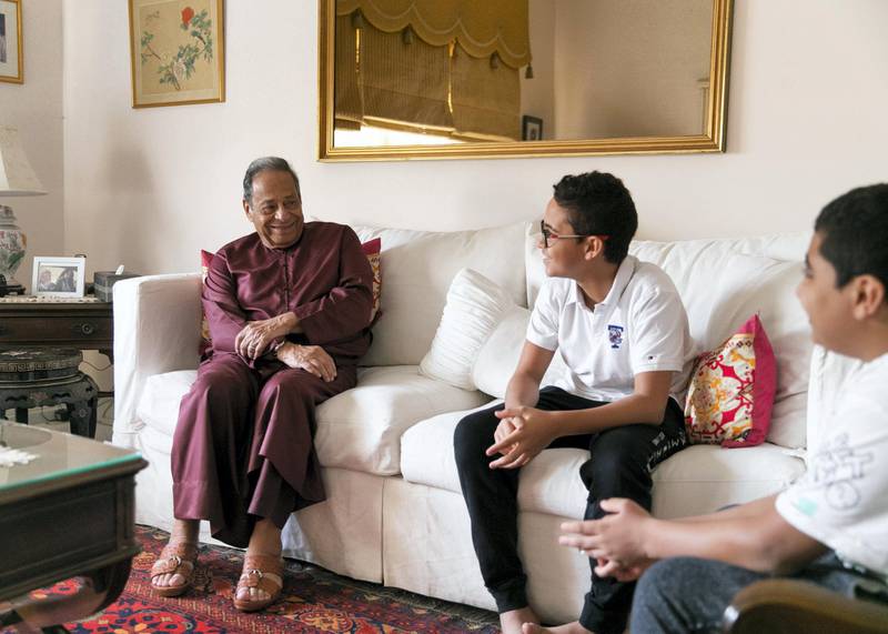 DUBAI, UNITED ARAB EMIRATES. 17 NOVEMBER 2020. Mohamed Zakariya, in his villa in Umm Suqeim, with his nephews Laith and Rayan. Mohamed came to Dubai in 1962 from Cairo.(Photo: Reem Mohammed/The National)Reporter: ANNA ZACHARIASSection: 1971 NATIONAL DAY NA