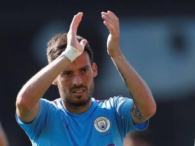 Manchester City's David Silva applauds fans after the match. Reuters