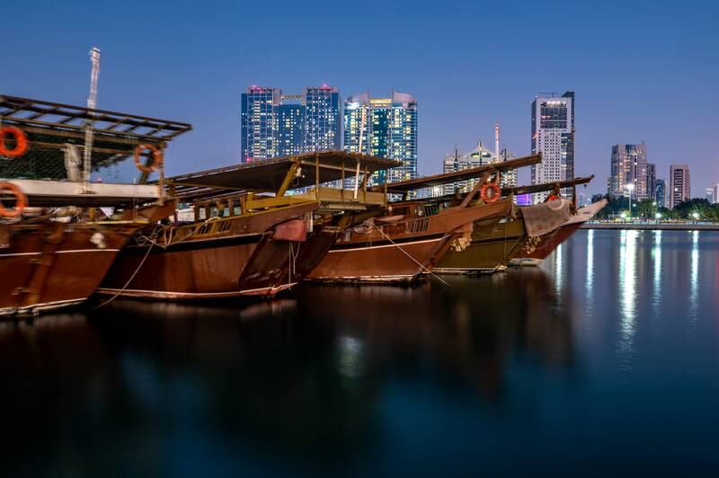 Dhows at anchor on a winter's evening in Abu Dhabi. Victor Besa / The National
