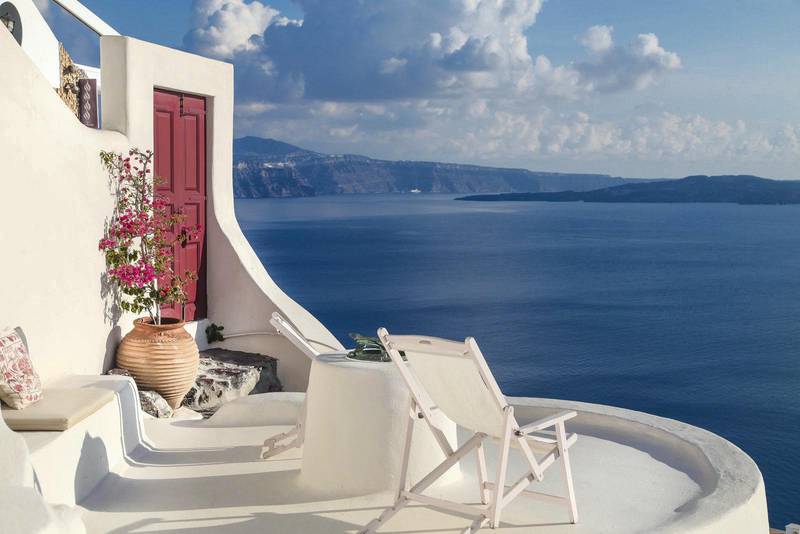 9. Ocean vistas and an architecturally unique cave home in Greece's Santorini. The house used to be the area's old bakery.