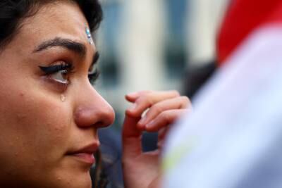 A protester cries during a rally in Berlin. Reuters