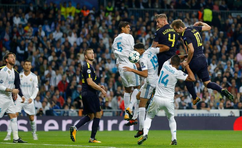 Tottenham's Harry Kane, right, tries to score with the head next to Real Madrid's Casemiro during a Group H Champions League soccer match between Real Madrid and Tottenham Hotspur at the Santiago Bernabeu stadium in Madrid, Tuesday, Oct. 17, 2017. (AP Photo/Francisco Seco)