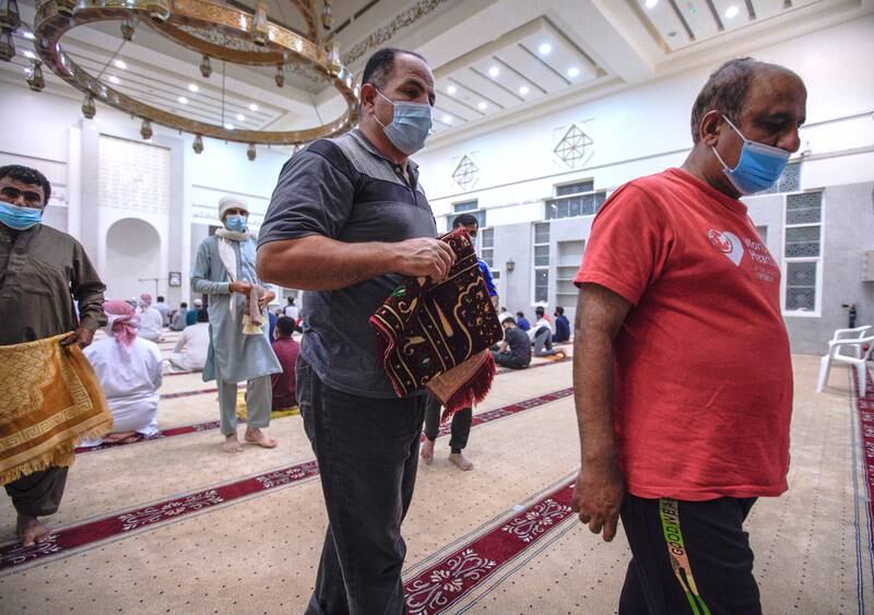 Worshippers leave Al Khayle Mosque in Khalifa City, Abu Dhabi, after the first fajr prayers of Ramadan.