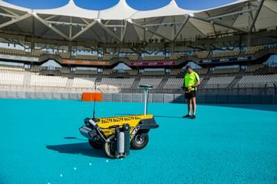 A robot painter does its duty. Photo: Yas Marina Circuit