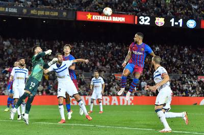 Barcelona's Dutch forward Memphis Depay heads the ball. AFP