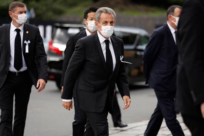 Former French president Nicolas Sarkozy arrives for the funeral. Getty Images