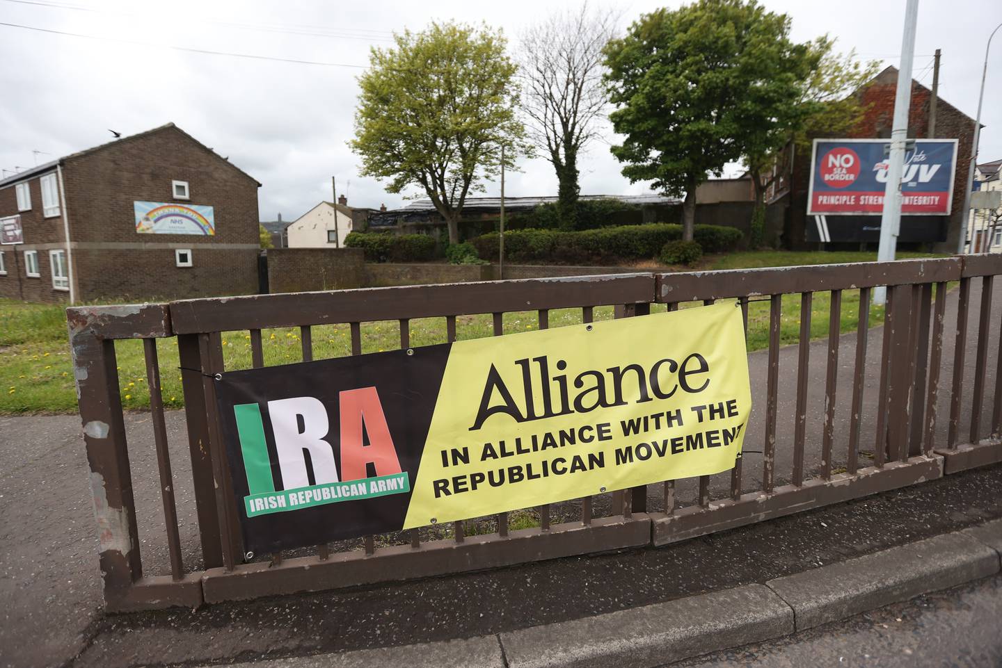 A banner alleging links between the Alliance Party and the IRA is displayed in Newtownards, County Down. PA