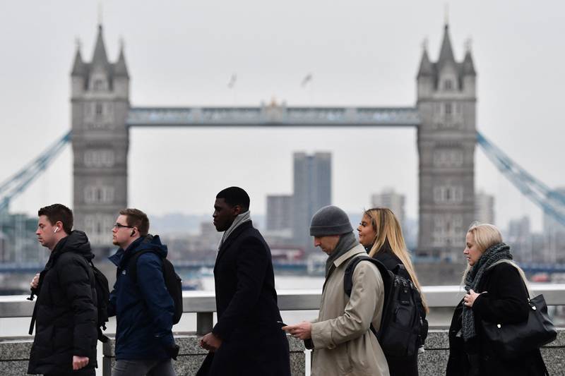 A quarter of British workers have cited long Covid as the cause for lengthy absences from work, a survey has shown. AFP