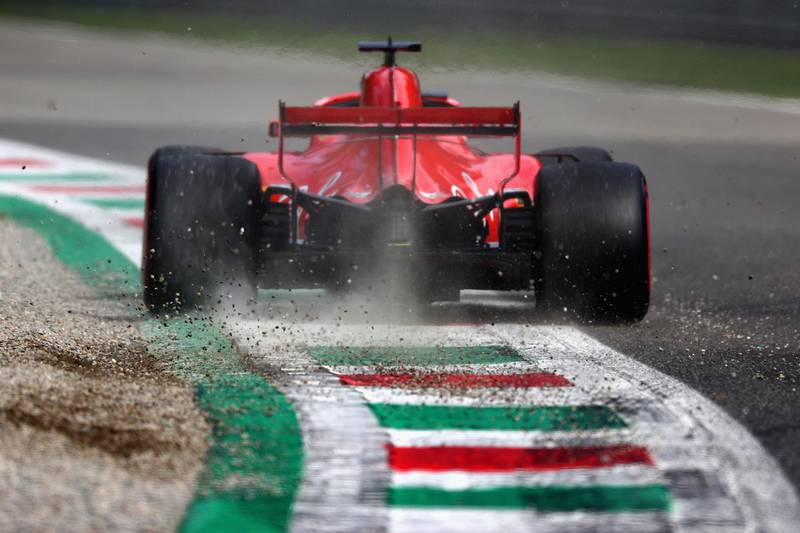 MONZA, ITALY - SEPTEMBER 01: Sebastian Vettel of Germany driving the (5) Scuderia Ferrari SF71H kicks up gravel after running wide during qualifying for the Formula One Grand Prix of Italy at Autodromo di Monza on September 1, 2018 in Monza, Italy.  (Photo by Lars Baron/Getty Images)