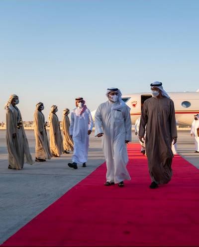 Bahrain's Crown Prince and Prime Minister, Prince Salman bin Hamad Al Khalifa is received by the Crown Prince of Abu Dhabi and Deputy Supreme Commander of the United Arab Emirates (UAE) Armed Forces, Sheikh Mohammed bin Zayed Al Nahyan upon his arrival to Abu Dhabi, United Arab Emirates. Bahrain News Agency