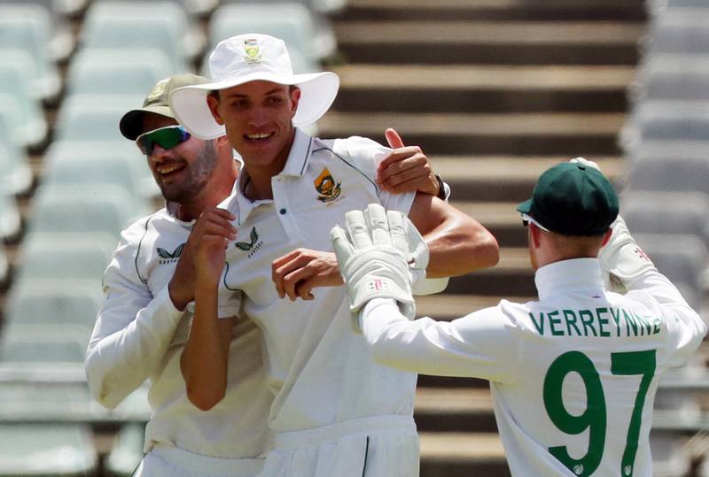 South Africa's Marco Jansen celebrates taking a catch to dismiss India batsman Ravichandran Ashwin. Reuters