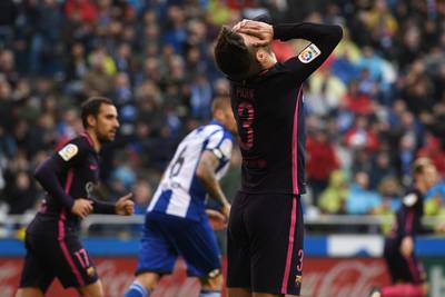 Gerard Pique of Barcelona reacts after missing a goal opportunity. Octavio Passos / Getty Images