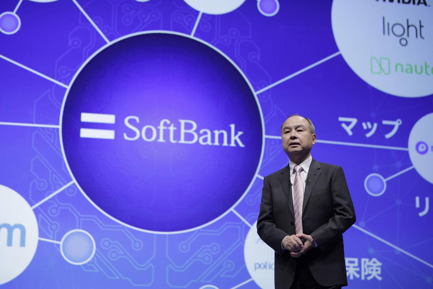 Masayoshi Son, chairman and chief executive officer of SoftBank Group Corp., speaks during a news conference in Tokyo, Japan, on Thursday, Oct. 4, 2018. Japan's SoftBank and Toyota Motor Corp. are teaming up on ride-hailing and self-driving cars as they accelerate their push into a market dominated by U.S. technology and car companies. Photographer: Kiyoshi Ota/Bloomberg