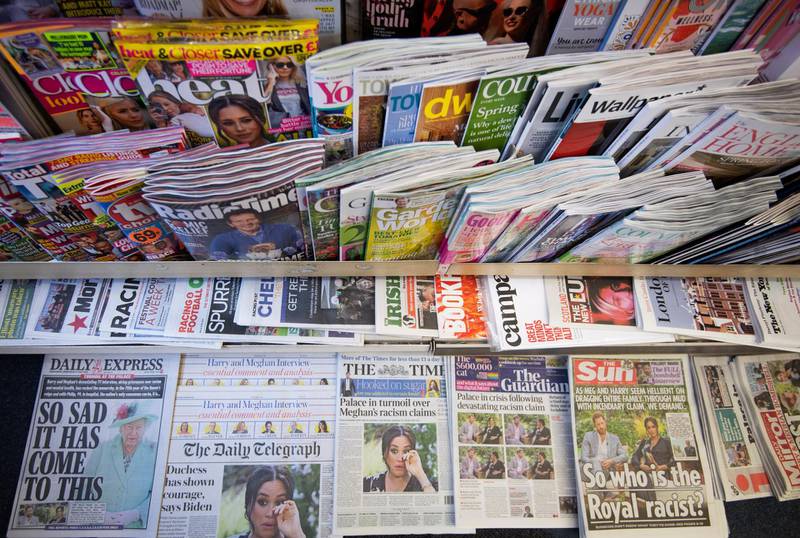epa09063786 A newspaper stand in London, Britain, 09 March 2021. US channel CBS aired a television interview with Britain's Harry and Meghan, Duke and Duchess of Sussex on 07 March. Buckingham Palace is yet to respond to racism allegations following the TV interview that was broadcast in the UK on 08 March.  EPA/FACUNDO ARRIZABALAGA