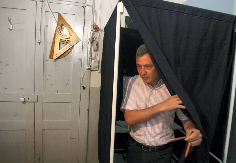 Leader of the opposition Maronite Christian Al-Marada movement Sleiman Franjieh walks out of a voting booth to cast his vote at a polling station at the northern Lebanse town of Zgharta on June 7, 2009. Lebanese voters cast their ballots in a high-stakes general election pitting a Western-backed coalition against an Iranian-backed alliance led by the Hezbollah militant group. AFP PHOTO/STR / AFP PHOTO