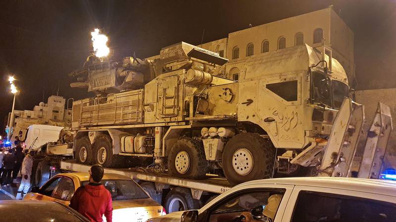 Forces loyal to Libya's UN-recognised Government of National Accord (GNA) parade a Pantsir air defense system truck in the capital Tripoli on May 20, 2020, after its capture at al-Watiya airbase (Okba Ibn Nafa airbase) from forces loyal to Libya's eastern-based strongman Khalifa Haftar. Libya's UN-recognised government scored another battlefield victory on May 18 against strongman Khalifa Haftar, capturing the key rear base used by his fighters in a conflict now in its second year. Haftar, who controls swathes of eastern Libya, launched an offensive in April last year against the capital Tripoli, seat of the UN-recognised Government of National Accord (GNA). / AFP / Mahmud TURKIA
