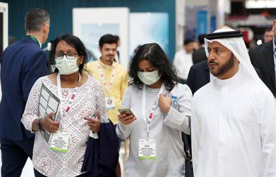 DUBAI, UNITED ARAB EMIRATES , Jan 29  – 2020 :- Visitors wearing protective face mask at the Arab Health conference held at Dubai World Trade Centre in Dubai. ( Pawan  Singh / The National ) For News/Online