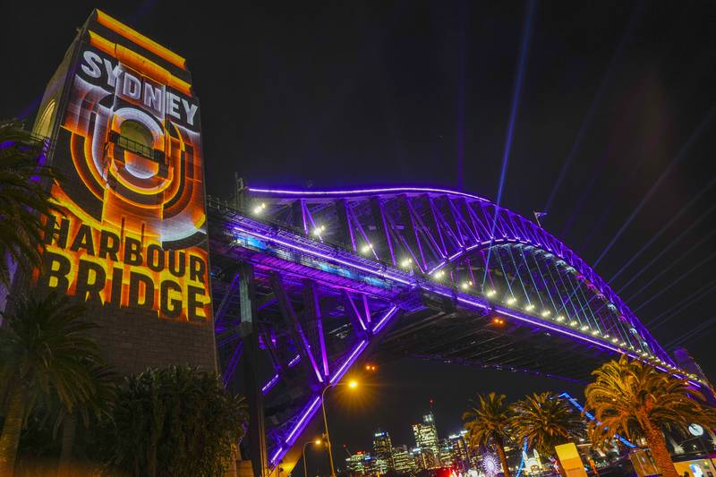 Sydney Harbour Bridge is illuminated in 'Royal Purple' to mark the 70th anniversary of the coronation of Queen Elizabeth II. AP