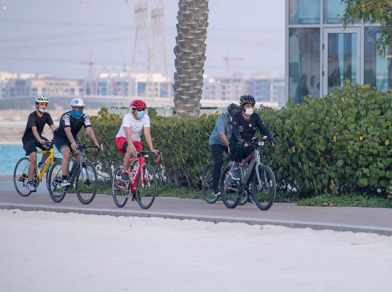 Sheikh Mohammed bin Rashid, Vice President and Ruler of Dubai, and family cycle around Dubai on Thursday. Courtesy: Dubai Media Office
