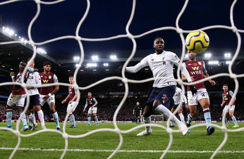 BIRMINGHAM, ENGLAND - NOVEMBER 02: Divock Origi of Liverpool watches a shot by Sadio Mane of Liverpool (not pictured) cross the line for him to score his team's second goal during the Premier League match between Aston Villa and Liverpool FC at Villa Park on November 02, 2019 in Birmingham, United Kingdom. (Photo by Marc Atkins/Getty Images)