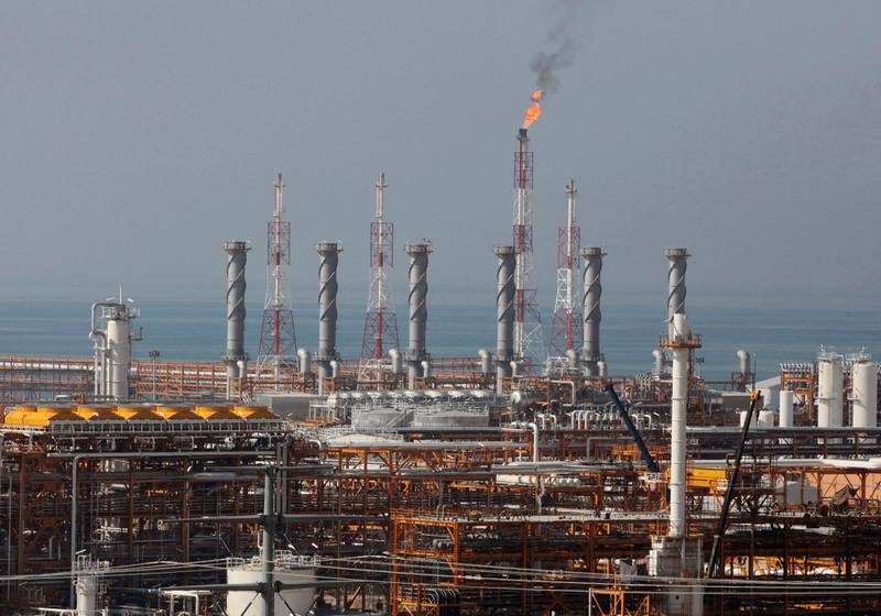 FILE - In this Jan. 22, 2014, file photo, a partially constructed gas refinery at the South Pars gas field is seen on the northern coast of Persian Gulf in Asalouyeh, Iran. Japan, South Korea and other major oil importers welcomed Tuesday the decision by the Trump administration to let them continue to import Iranian crude oil and other petroleum products despite the re-imposition of sanctions on Tehran. (AP Photo/Vahid Salemi, File)