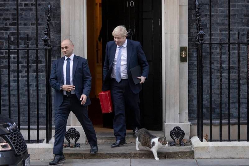 Prime Minister Boris Johnson leaves 10 Downing Street to make a statement at Parliament following publication of the Gray Report into lockdown parties. Getty.
