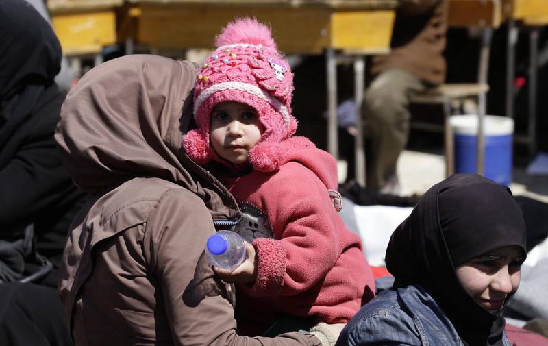 Many of the people fleeing Eastern Ghouta were women and children. Louia Beshara / AFP