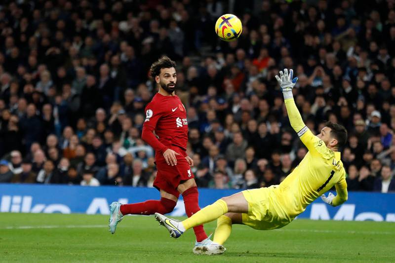 Liverpool's Mohamed Salah scores his team's second goal past Tottenham Hotspur goalkeeper Hugo Lloris in the  2-1 Premier League win at Tottenham Hotspur Stadium, London, on November 6, 2022. AFP