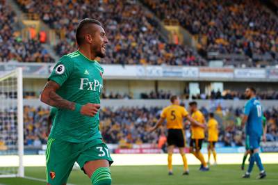 Soccer Football - Premier League - Wolverhampton Wanderers v Watford - Molineux Stadium, Wolverhampton, Britain - October 20, 2018  Watford's Roberto Pereyra celebrates scoring their second goal   Action Images via Reuters/Andrew Boyers  EDITORIAL USE ONLY. No use with unauthorized audio, video, data, fixture lists, club/league logos or "live" services. Online in-match use limited to 75 images, no video emulation. No use in betting, games or single club/league/player publications.  Please contact your account representative for further details.